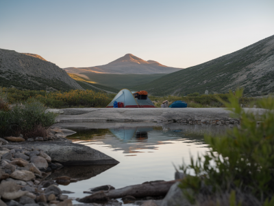How to plan a low-impact wild camp after a multi-day border hike using trains and local resupply points
